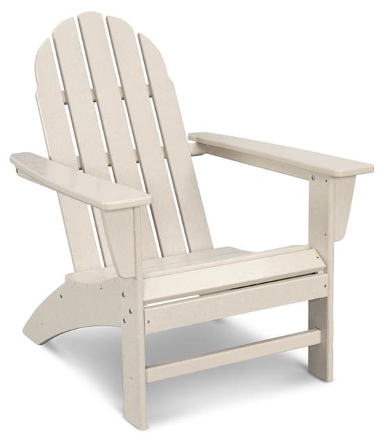 White Adirondack chair with a slatted backrest and wide armrests.