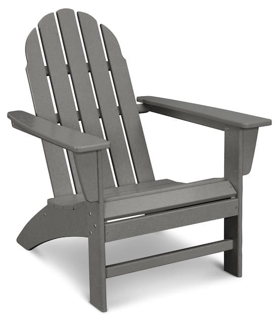 Gray Adirondack chair with a slatted back and wide armrests, perfect for outdoor relaxation.
