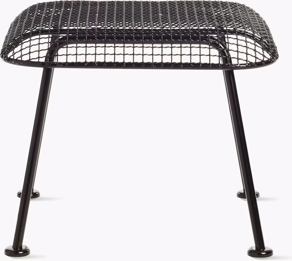 A modern black mesh side table with a simple structure featuring a rectangular top and four slender legs.
