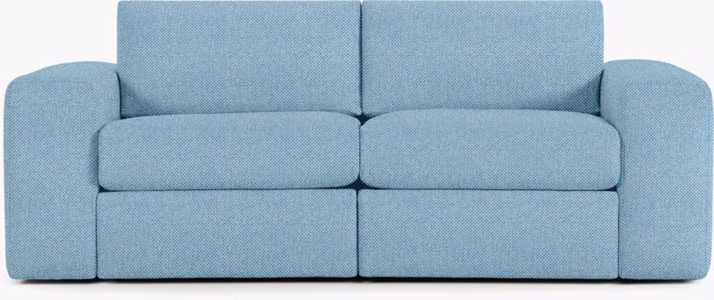 A light blue, modern sofa featuring a minimalist design with rounded edges and plush cushions, displaying a seamless look.