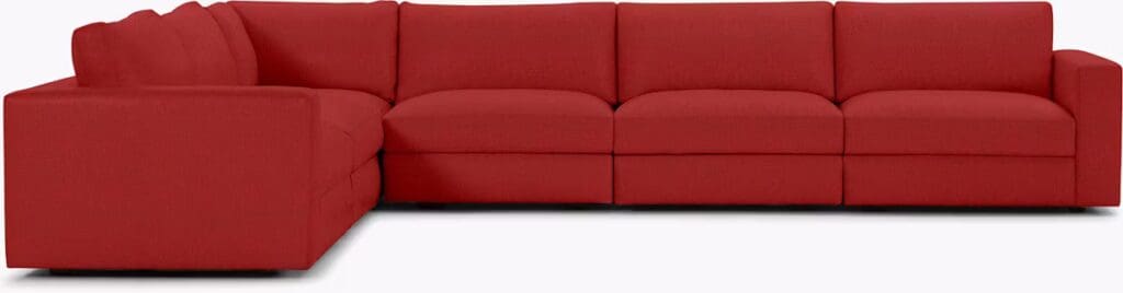 A modern red sectional sofa with plush cushions and clean lines, designed for comfort and elegance.