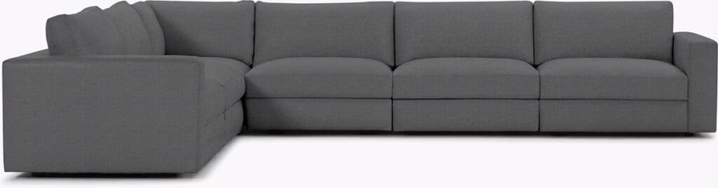 Gray sectional sofa with a modern design, featuring plush cushions and a contemporary silhouette.
