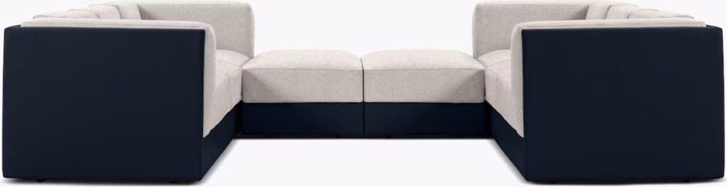 Symme Sofa sectional with a combination of gray fabric and navy blue upholstery, featuring a modern design.