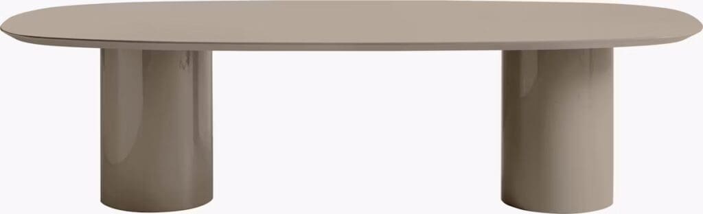 Modern oval coffee table with a smooth surface and rounded pedestal legs.