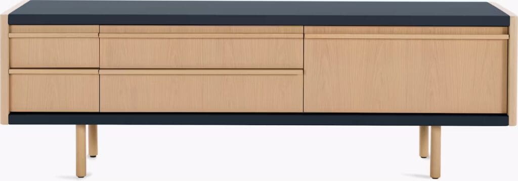 Modern wooden sideboard with a dark countertop and multiple drawers, designed for contemporary interiors.