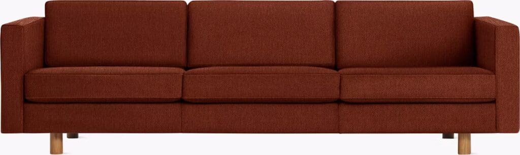 Front view of a stylish brown fabric sofa with a minimalist design and wooden legs.