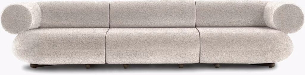 A contemporary sofa with a unique design featuring rounded arms and a textured light-colored fabric.