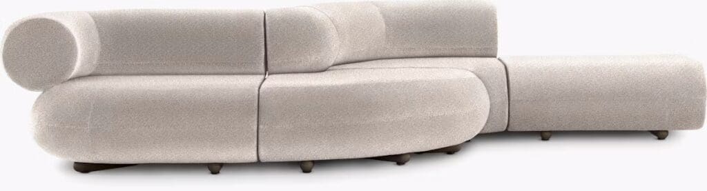 A modern, curved beige sectional sofa with smooth surfaces and rounded edges, showcasing its comfortable and stylish design.