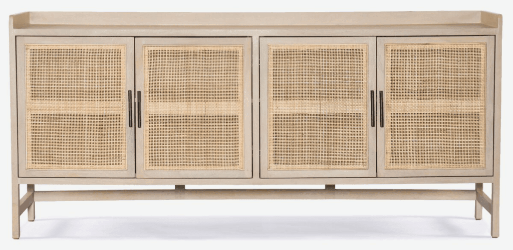 A modern wooden media cabinet with cane front panels and tapered legs, designed for stylish storage.