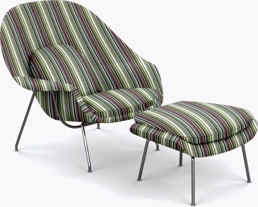 A mid-century modern armchair with a colorful striped fabric design and a matching ottoman, both resting on slender metal legs.