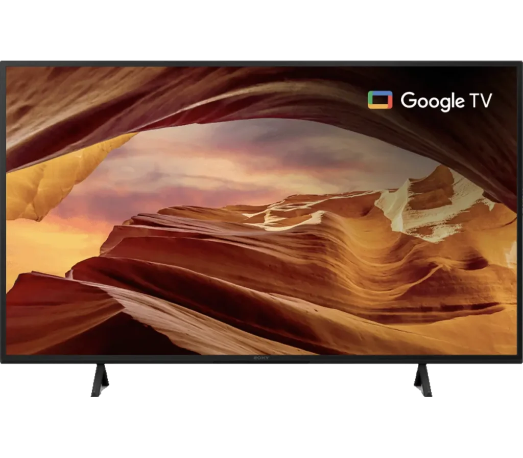 A modern television displaying a scenic desert landscape with vibrant colors, featuring a Google TV logo on the screen.
