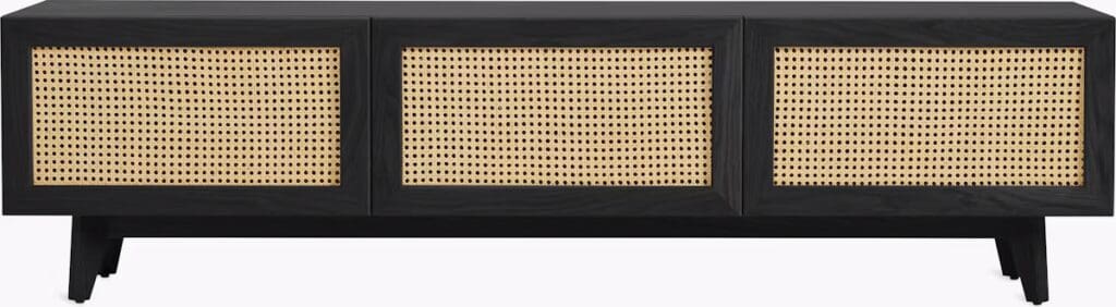 A modern wooden media cabinet featuring cane front panels and set on tapered legs.